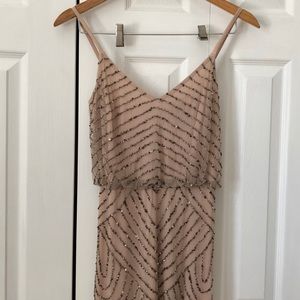 Gorgeous blush colored beaded evening gown.